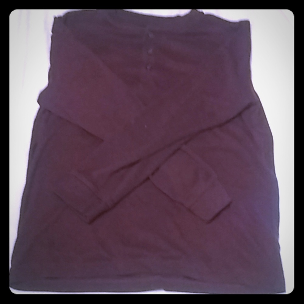 This is a Small red 60% cotton long sleeve shirt